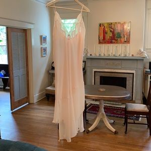 Beautiful light pink gown with ivory lace and sheer detailing at bottom